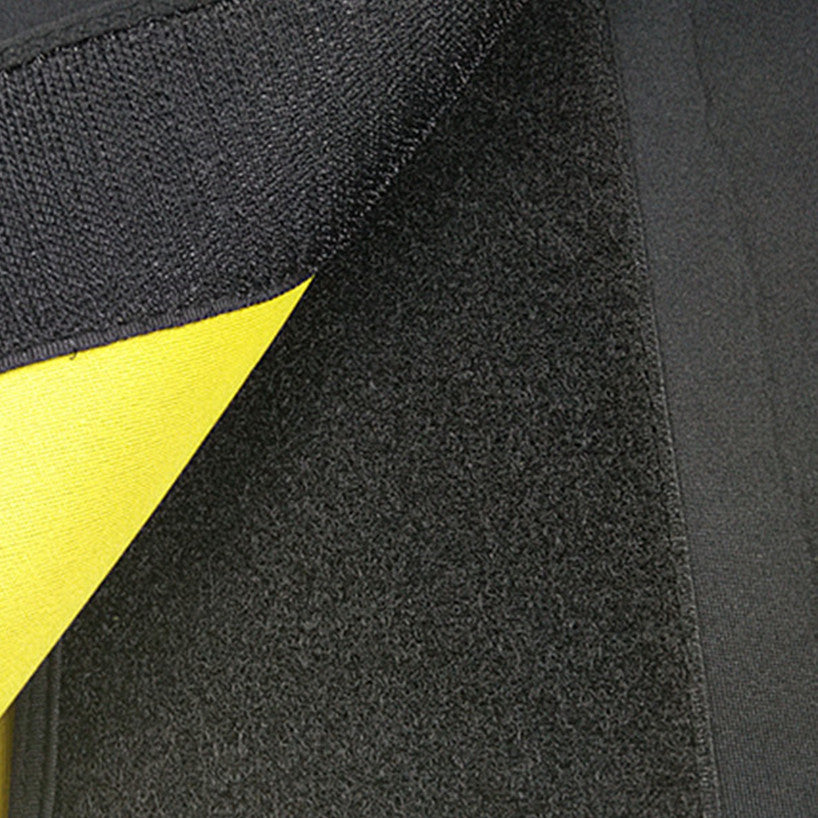 Close-up of black fabric with a yellow stripe